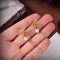 Dior Gold Logo Script Pearl Drop Earrings